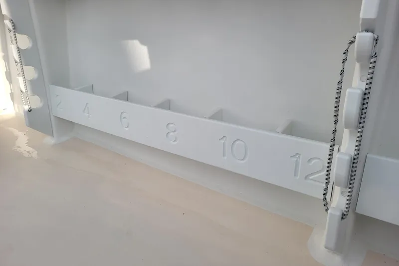 Slide: The Image of 2021 Steiger Craft 255 DV MIAMI boat interior with numbered storage compartments. - 72