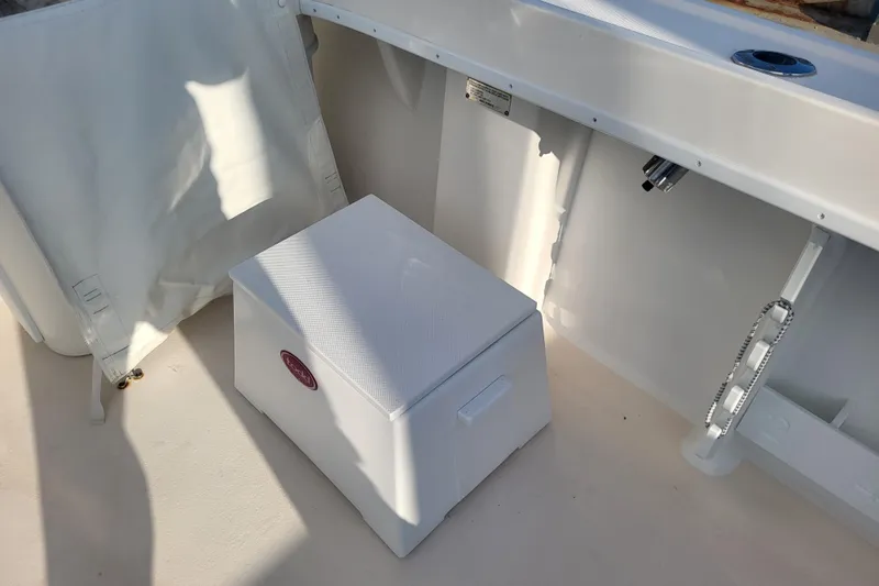 Slide: The Image of 2021 Steiger Craft 255 DV MIAMI boat interior with storage box and seating area. - 74