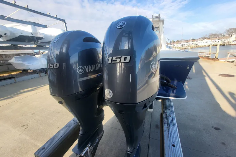 Slide: The Image of 2021 Steiger Craft 255 DV MIAMI with dual Yamaha 150 engines docked. - 76