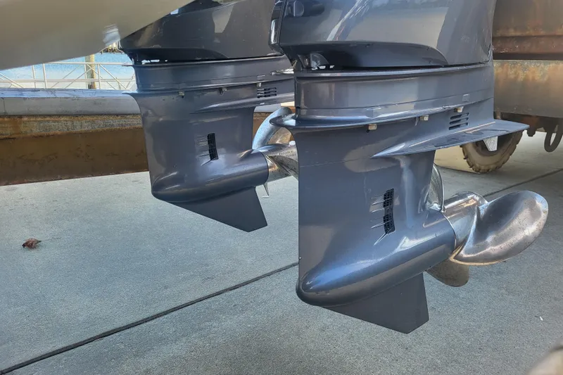 Slide: The Image of Twin outboard motors on a 2021 Steiger Craft 255 DV MIAMI boat. - 77