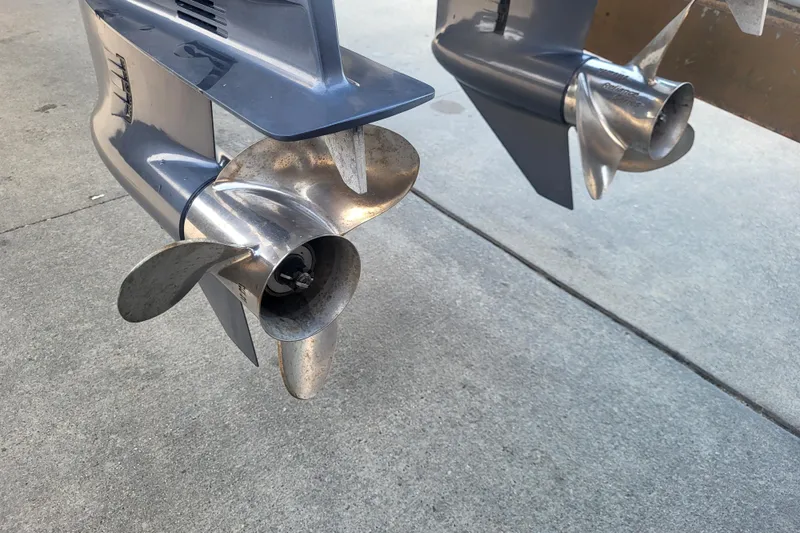 Slide: The Image of 2021 Steiger Craft 255 DV MIAMI boat propellers on concrete surface. - 78