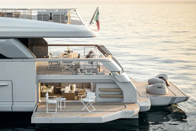 Slide: The Image of Luxurious 2028 Sanlorenzo SD132 yacht with elegant outdoor seating and ocean view. - 24