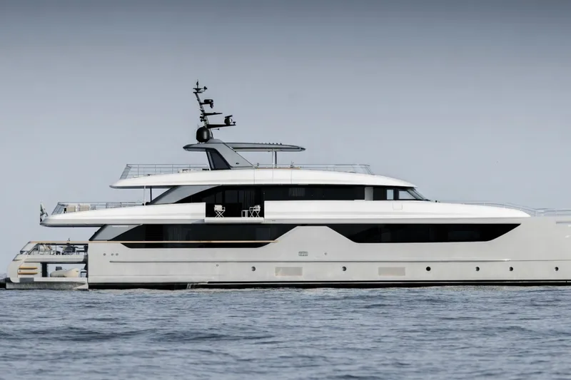 Slide: The Image of Luxurious 2028 Sanlorenzo SD132 yacht cruising on calm waters. - 3