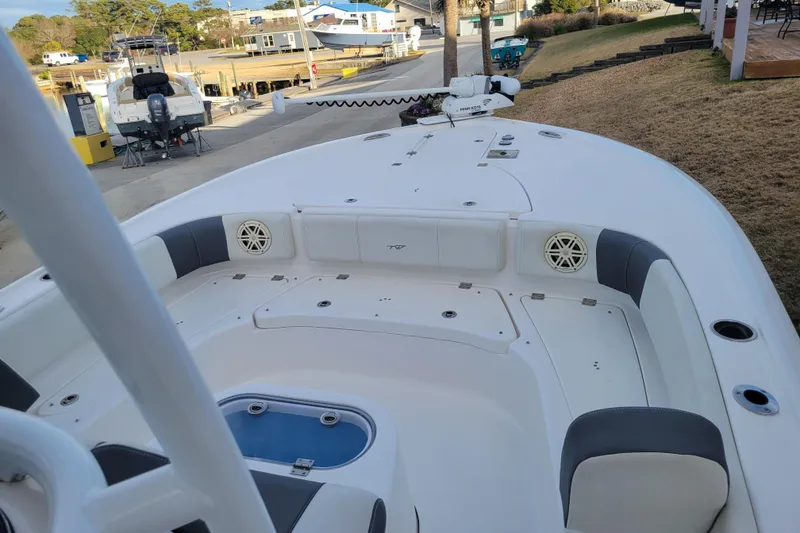 Slide: The Image of 2020 Tidewater 2700 Carolina Bay boat interior with seating and storage compartments. - 12