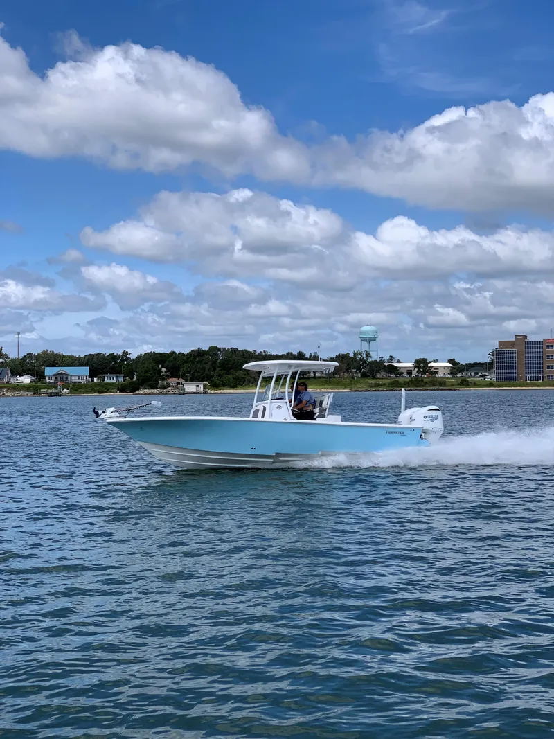 Slide: The Image of 2020 Tidewater 2700 Carolina Bay boat on the water. - 2