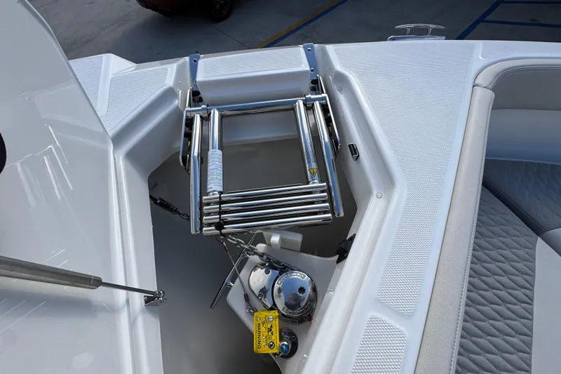 Slide: The Image of Solace 30 CS 2026 boat with stainless steel ladder and anchor compartment. - 50