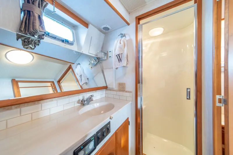 Slide: The Image of Bathroom interior of 1991 Tollycraft 57 Pilothouse Motor Yacht with shower and sink. - 30