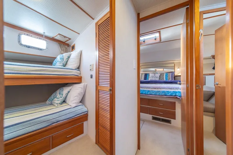 Slide: The Image of Interior of 1991 Tollycraft 57 Pilothouse Motor Yacht with cozy bunk beds and bedroom. - 37