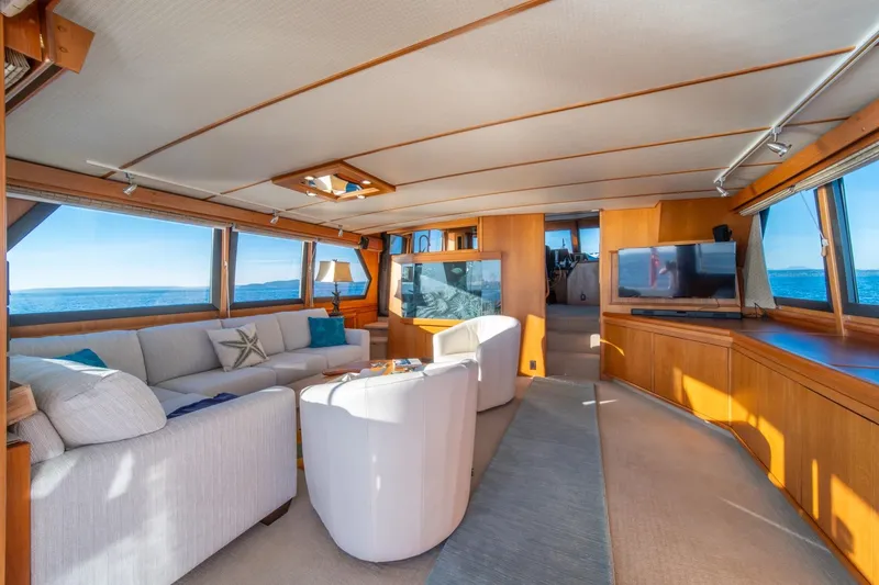 Slide: The Image of Luxurious interior of 1991 Tollycraft 57 Pilothouse Motor Yacht with ocean view. - 8