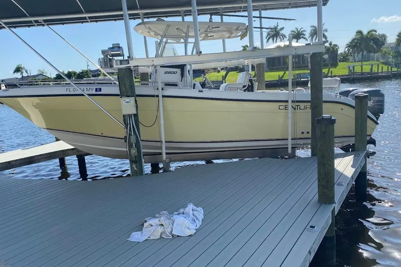 The Image of 2005 Century 2900 Center Console boat docked on a sunny day. - 0