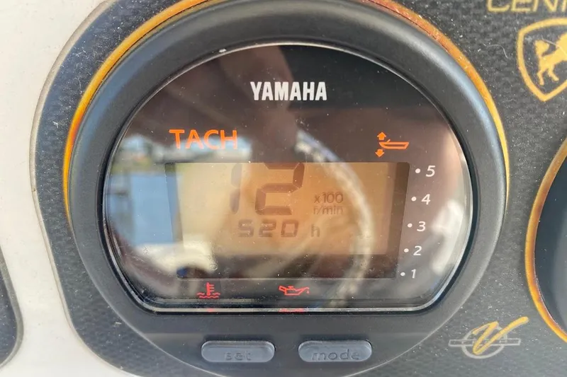 Slide: The Image of Yamaha tachometer on 2005 Century 2900 Center Console boat dashboard. - 14