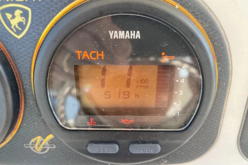 Slide: The Image of Yamaha tachometer displaying 519 hours on a 2005 Century 2900 Center Console boat. - 15