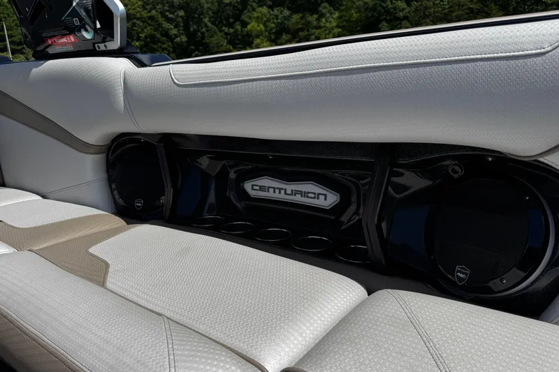 Slide: The Image of 2023 Centurion Ri265 boat interior with premium seating and audio system. - 17