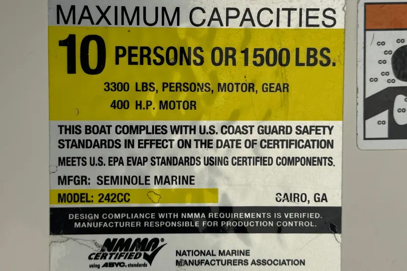 Slide: The Image of 2022 Sailfish 242 CC capacity label: 10 persons, 1500 lbs, 400 HP motor compliance. - 32