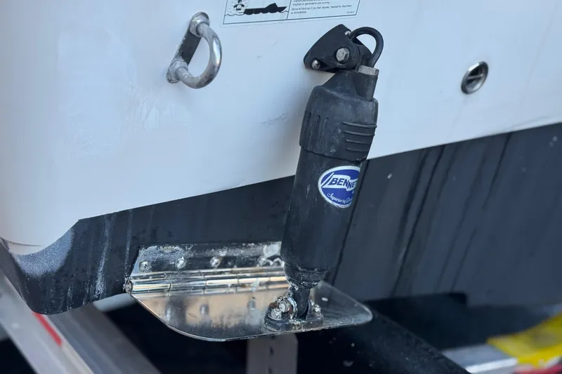 Slide: The Image of Trim tab on 2022 Sailfish 242 CC boat with Bennett actuator. - 8