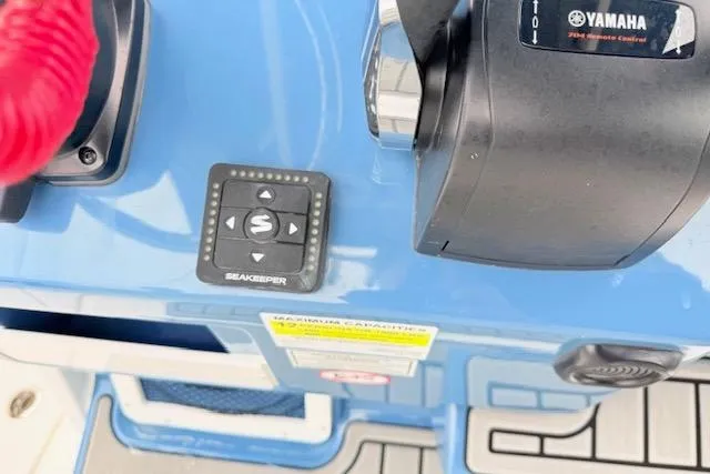 Slide: The Image of Control panel of 2026 Tidewater 256 CC Adventure with Yamaha and Seakeeper systems. - 13