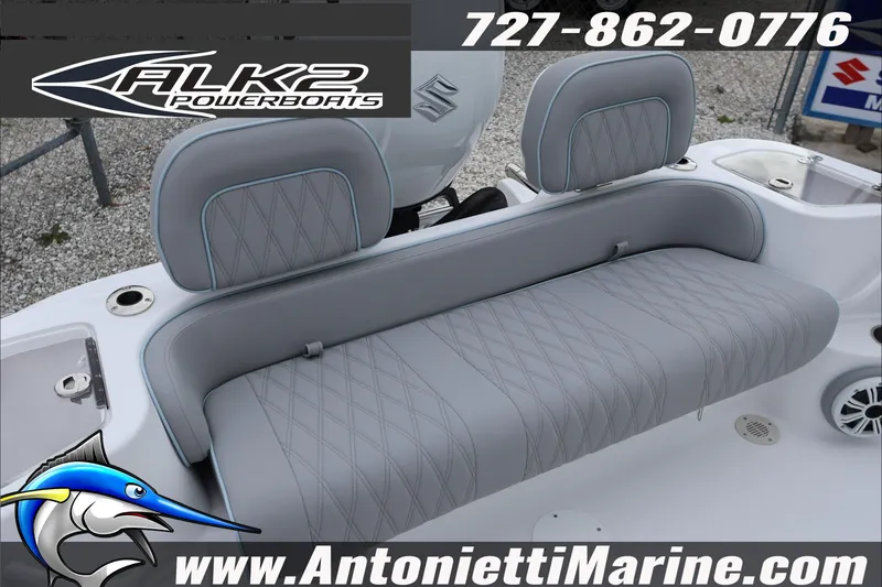 Slide: The Image of 2026 ALK2 Powerboats 23 CRX with gray cushioned seating, contact details, and logo. - 14