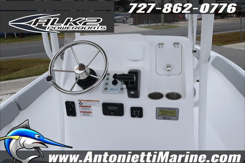 Slide: The Image of 2026 ALK2 Powerboats 23 CRX dashboard with steering wheel and controls, Antonietti Marine branding. - 16