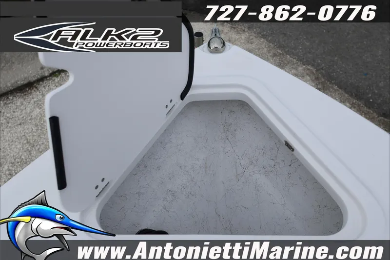 Slide: The Image of 2026 ALK2 Powerboats 23 CRX interior detail with contact information and logo. - 23