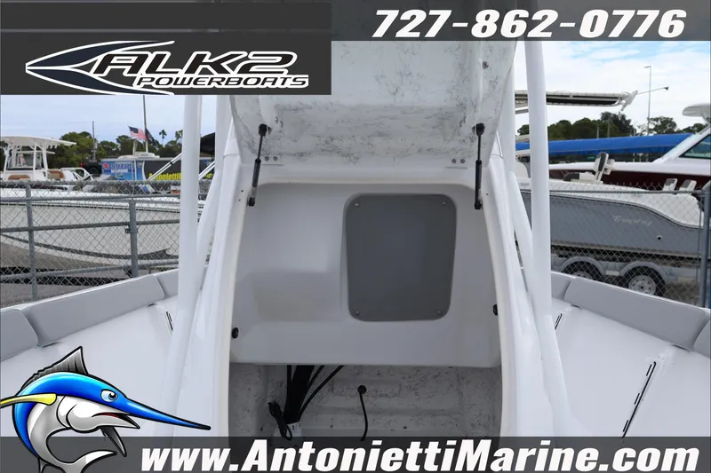 Slide: The Image of 2026 ALK2 Powerboats 23 CRX interior view at Antonietti Marine dealership. - 25
