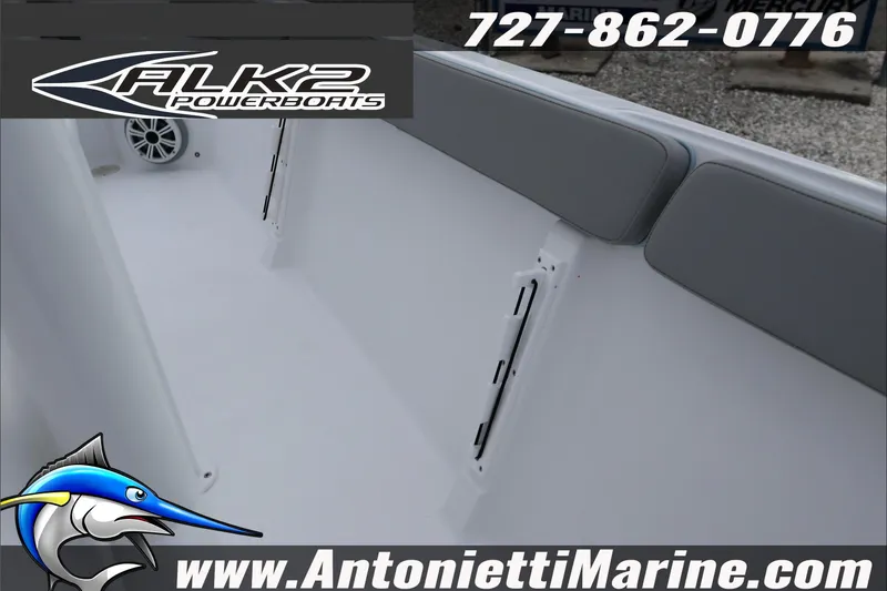 Slide: The Image of 2026 ALK2 Powerboats 23 CRX interior with seating, logo, and contact details. - 26