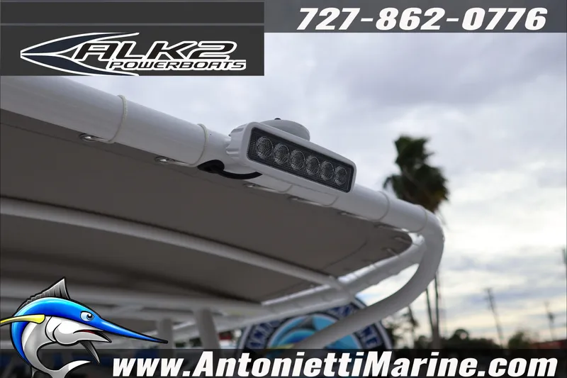 Slide: The Image of 2026 ALK2 Powerboats 23 CRX with canopy and LED light, Antonietti Marine branding. - 27