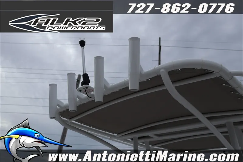 Slide: The Image of 2026 ALK2 Powerboats 23 CRX with rod holders, contact info, and Antonietti Marine logo. - 28