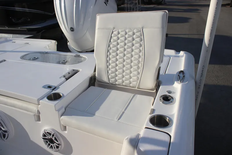 Slide: The Image of Luxury seating on 2026 Tidewater 2500 Carolina Bay boat, featuring elegant white upholstery. - 13