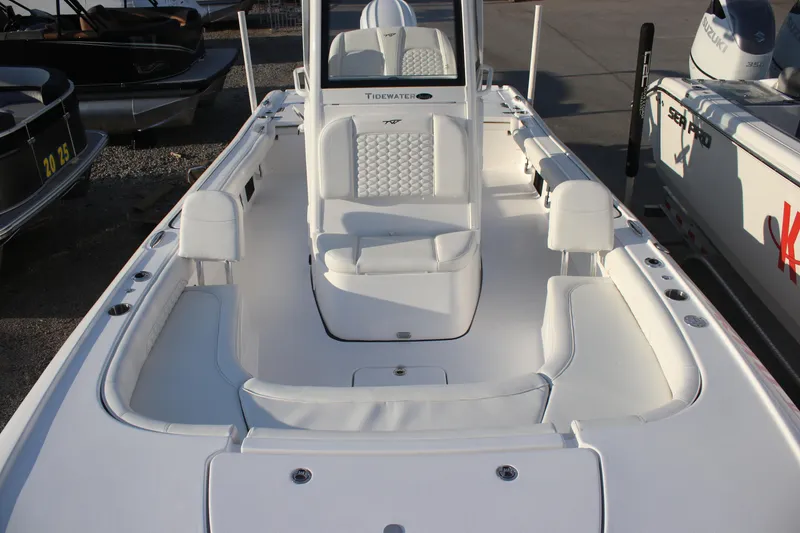 Slide: The Image of 2026 Tidewater 2500 Carolina Bay boat seat with quilted design and cup holders. - 20