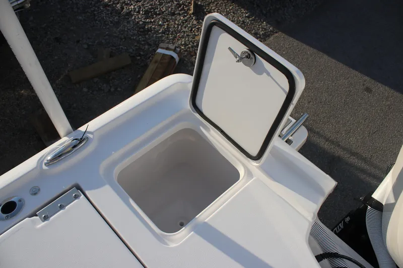 Slide: The Image of 2026 Tidewater 2500 Carolina Bay boat storage compartment with open hatch. - 27
