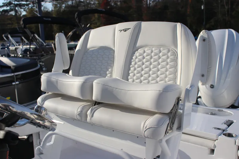 Slide: The Image of 2026 Tidewater 2500 Carolina Bay boat, aerial view of bow seating and storage compartments. - 8