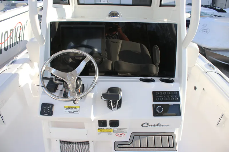 Slide: The Image of 2026 Tidewater 2500 Carolina Bay boat with Yamaha engine and dual seating. - 9
