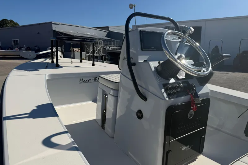 Slide: The Image of 2020 Maverick 18 HPX-V boat interior with steering console and controls. - 12