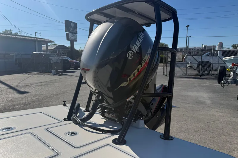 Slide: The Image of 2020 Maverick 18 HPX-V boat with Yamaha outboard motor in a parking lot. - 14