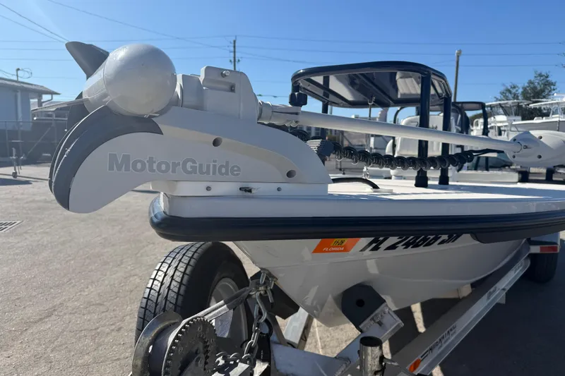 Slide: The Image of 2020 Maverick 18 HPX-V boat with MotorGuide trolling motor on trailer. - 18