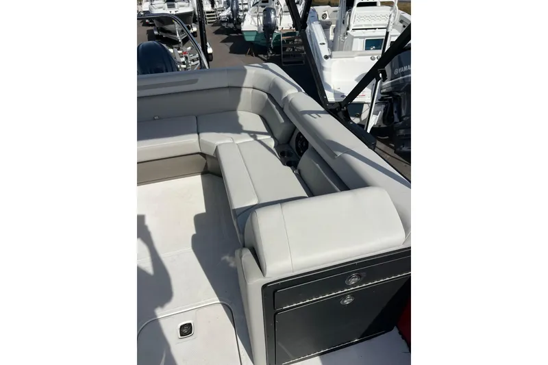 Slide: The Image of 2026 Hurricane FunDeck 2260 REF OB boat with spacious seating and modern design. - 10