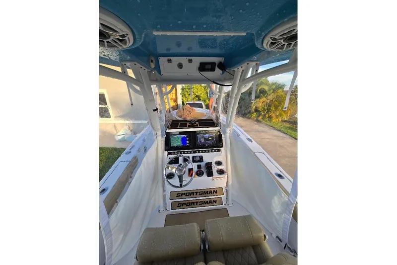 Slide: The Image of 2019 Sportsman Heritage 241 Center Console boat interior with navigation equipment. - 20