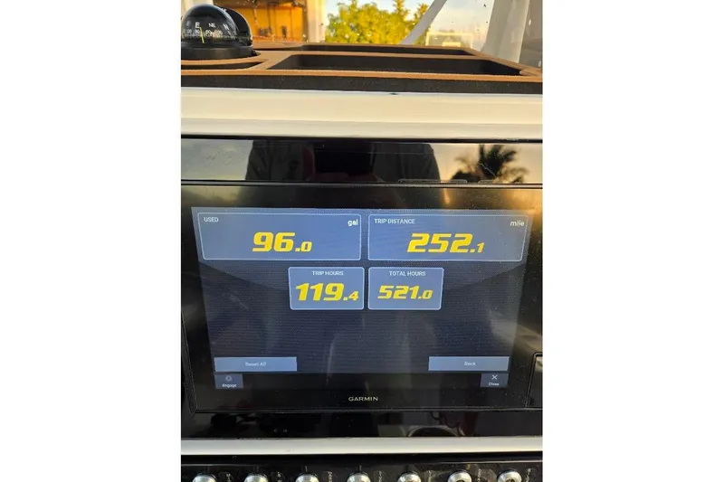 Slide: The Image of Display screen on 2019 Sportsman Heritage 241 Center Console showing fuel and trip data. - 35