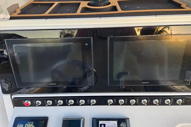 Slide: The Image of Dashboard of Sportsman Heritage 241 Center Console boat, year 2019. - 36