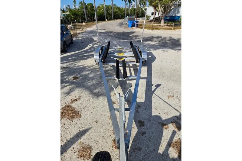 Slide: The Image of Trailer for 2019 Sportsman Heritage 241 Center Console boat on a sunny day. - 40