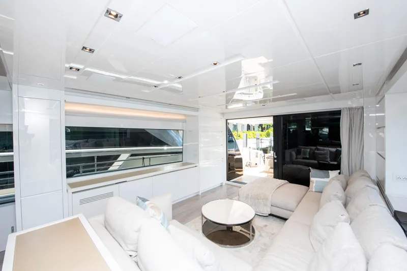 Slide: The Image of Luxurious interior of 2022 Sanlorenzo SL78 yacht with modern furnishings and large windows. - 14