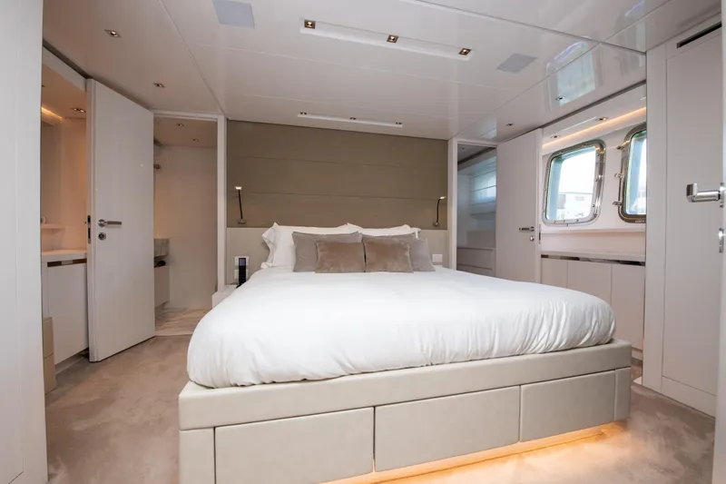Slide: The Image of Luxurious bedroom interior of 2022 Sanlorenzo SL78 yacht with modern design and elegant furnishings. - 23