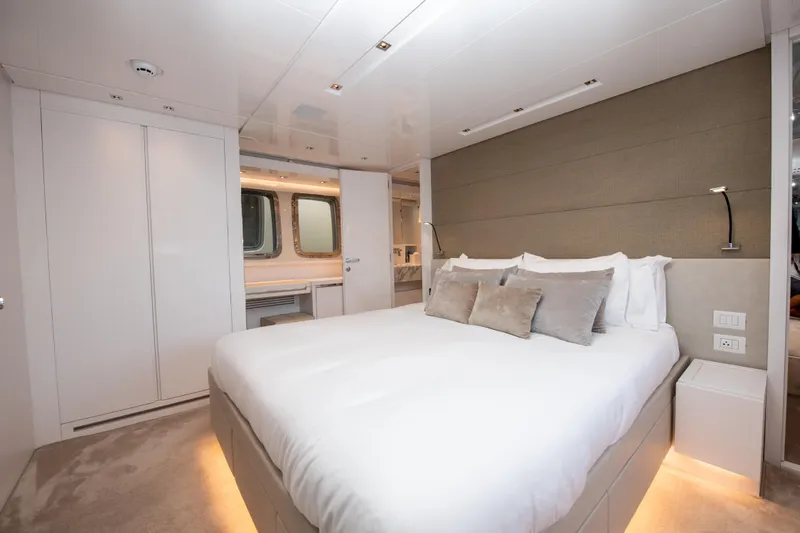 Slide: The Image of Luxurious bedroom interior of 2022 Sanlorenzo SL78 yacht with modern design and ambient lighting. - 24