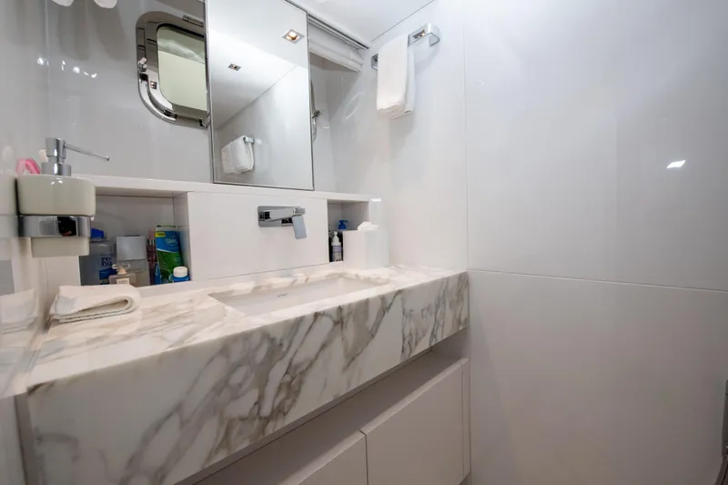 Slide: The Image of Luxurious marble bathroom in 2022 Sanlorenzo SL78 yacht, featuring modern fixtures and elegant design. - 25