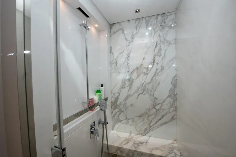 Slide: The Image of Luxurious marble shower in 2022 Sanlorenzo SL78 yacht bathroom. - 26
