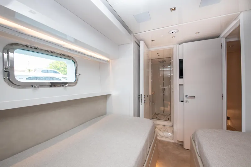 Slide: The Image of Luxurious interior of 2022 Sanlorenzo SL78 yacht with twin beds and modern bathroom. - 28