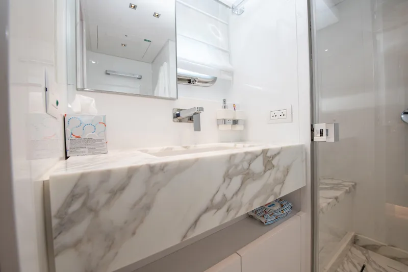 Slide: The Image of Luxurious marble bathroom in 2022 Sanlorenzo SL78 yacht, featuring modern fixtures and elegant design. - 29