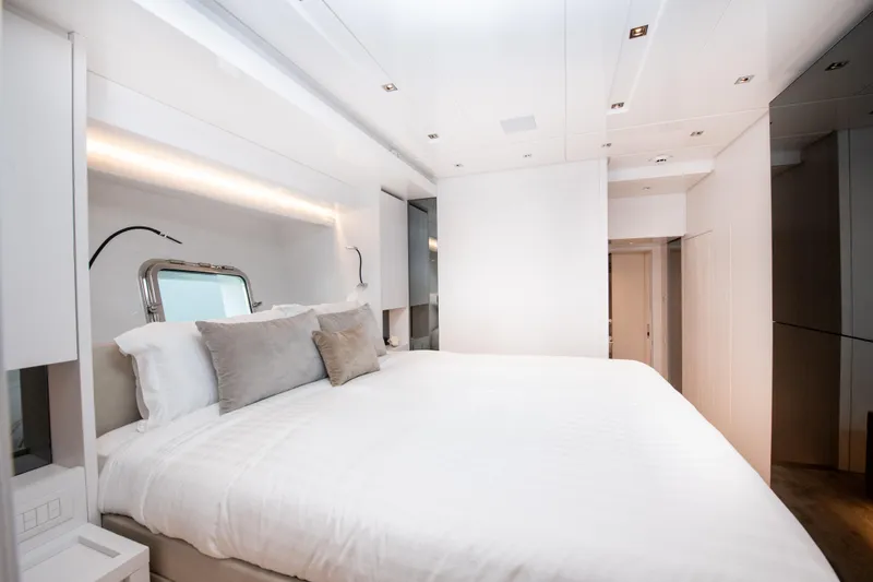 Slide: The Image of Luxurious bedroom interior of 2022 Sanlorenzo SL78 yacht with modern design and elegant bedding. - 31