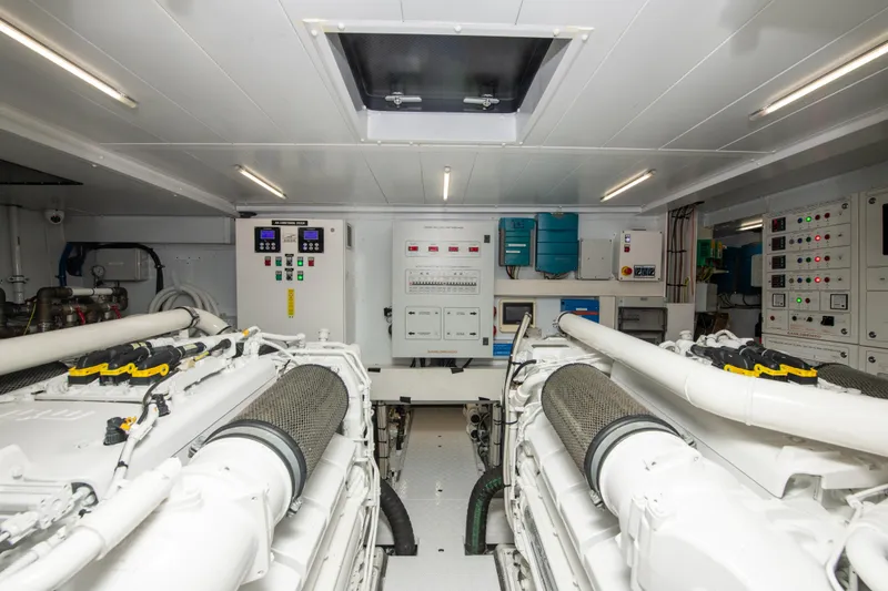 Slide: The Image of Engine room of 2022 Sanlorenzo SL78 yacht, featuring advanced machinery and control panels. - 33