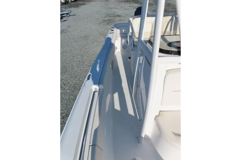 Slide: The Image of 2023 Sea Hunt Ultra 234 boat deck with sleek design and modern features. - 15